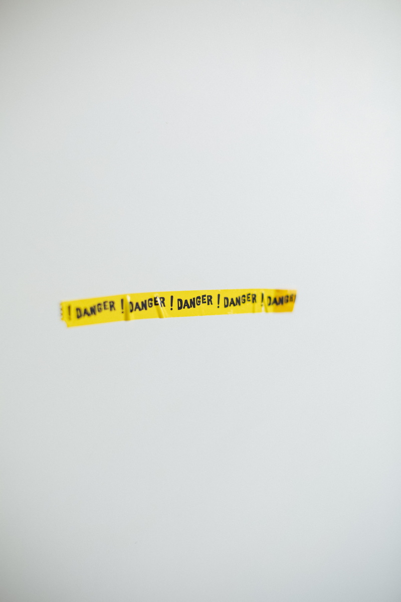 sign, wall, risk, symbol, hazard, concepts, vandalism, menace, sticker, harzad, peril, threat, danger, alarm, no People, message, emergency, jeopardy, white