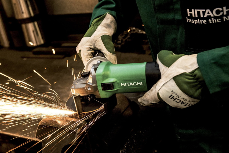 flexible, holding, indoors, safety, real people, building, one person, human hand, blurred motion, hand, motion, shipyard, occupation, industry, power tool