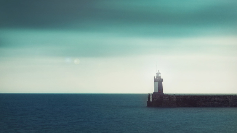 sea, lighthouse, horizon over water, travel destinations, house, direction, light, outdoors, building, architecture, nature, no people, beauty in nature