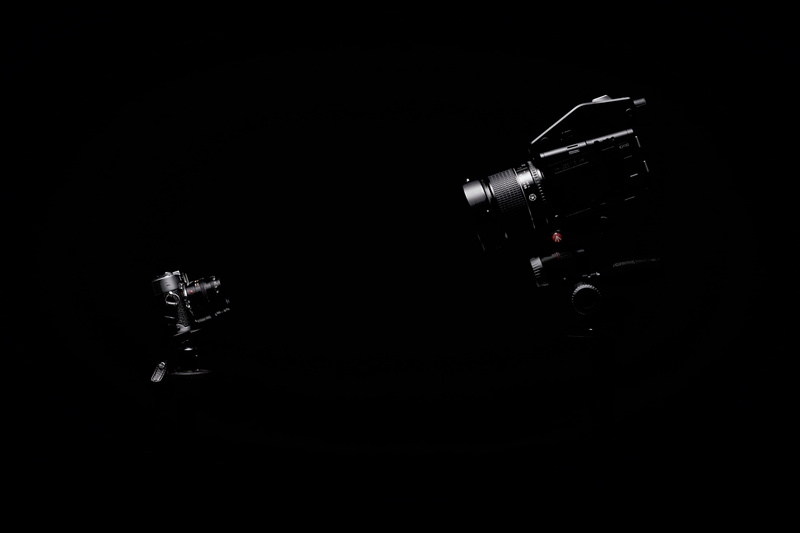 photography themes, camera - photographic equipment, no people, bottle, technology, two, lighting equipment, video, aggression, cut out, wireless technology