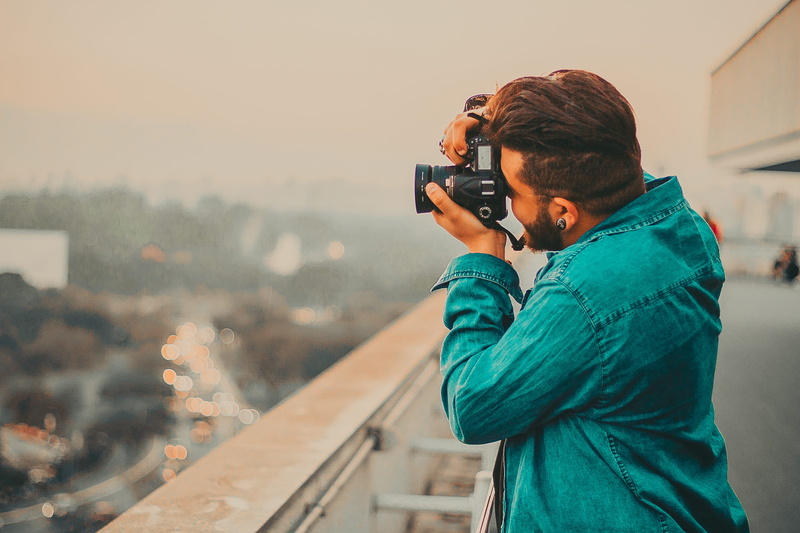 dslr, holding, people, shirt, 1080P, warm clothing, camera - photographic equipment, daylight, long, wireless technology, communication, shooting, sleeved