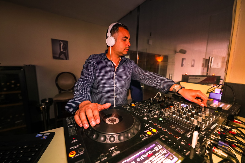 sound recording equipment, audio, phonograph record, DJ Mixer, audio equipment, nightclub, record, deejay, studio, party, sound mixer, headphones, indoors