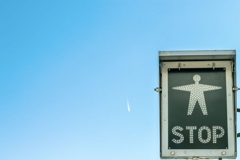 arrow, triangle, blue, star symbol, symbol, clear sky, signage, place, stop sign, day, man, western script, no people, direction, sky, nature, azure sky