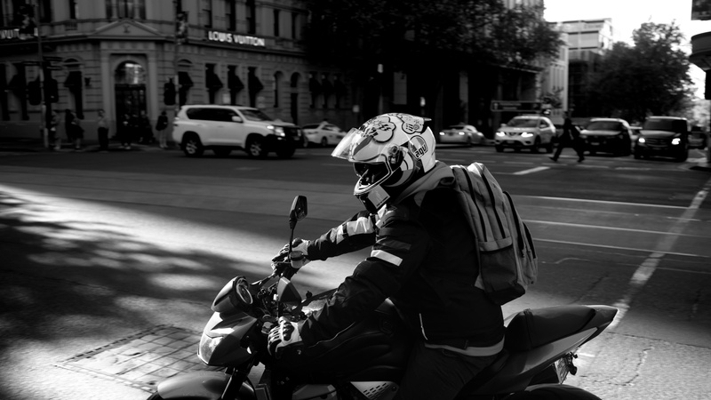 urban, motor, lifestyles, apparel, automobile, driving, land vehicle, adult, women, ride, road, intersection, mode of transportation, architecture, street