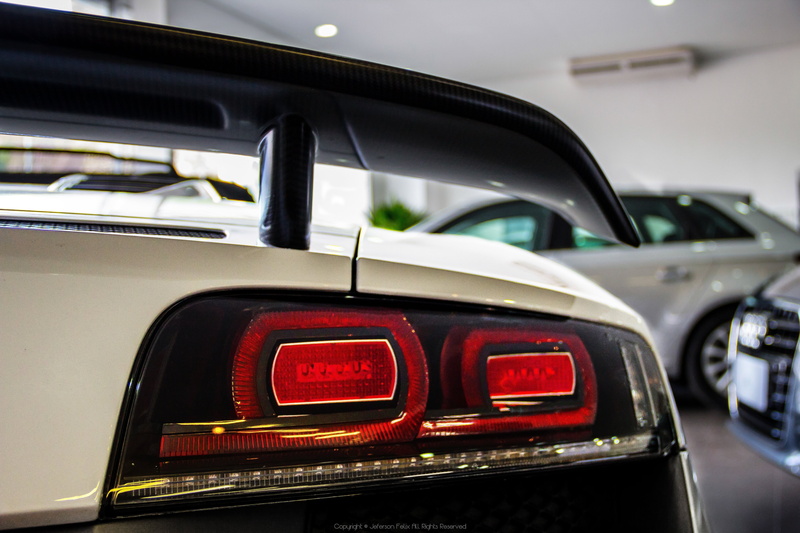 no people, lighting equipment, Audi, Audi R8 Spyder, modern, red, focus on foreground, tail light, indoors, motor vehicle, transportation, land vehicle