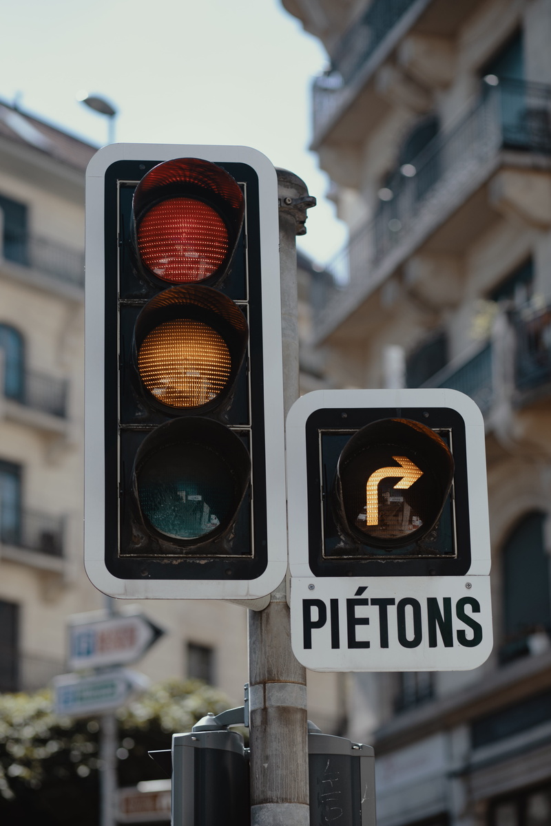 safety, arrow, urban, illuminated, stop, geneva, switzerland, logo, building, sign, close-up, focus on foreground, 5K, stoplight, traffic, road signal