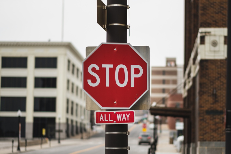 text, pillar, sign, road, capital letter, stop - single word, inscription, architecture, message, built structure, information, communication, stop sign