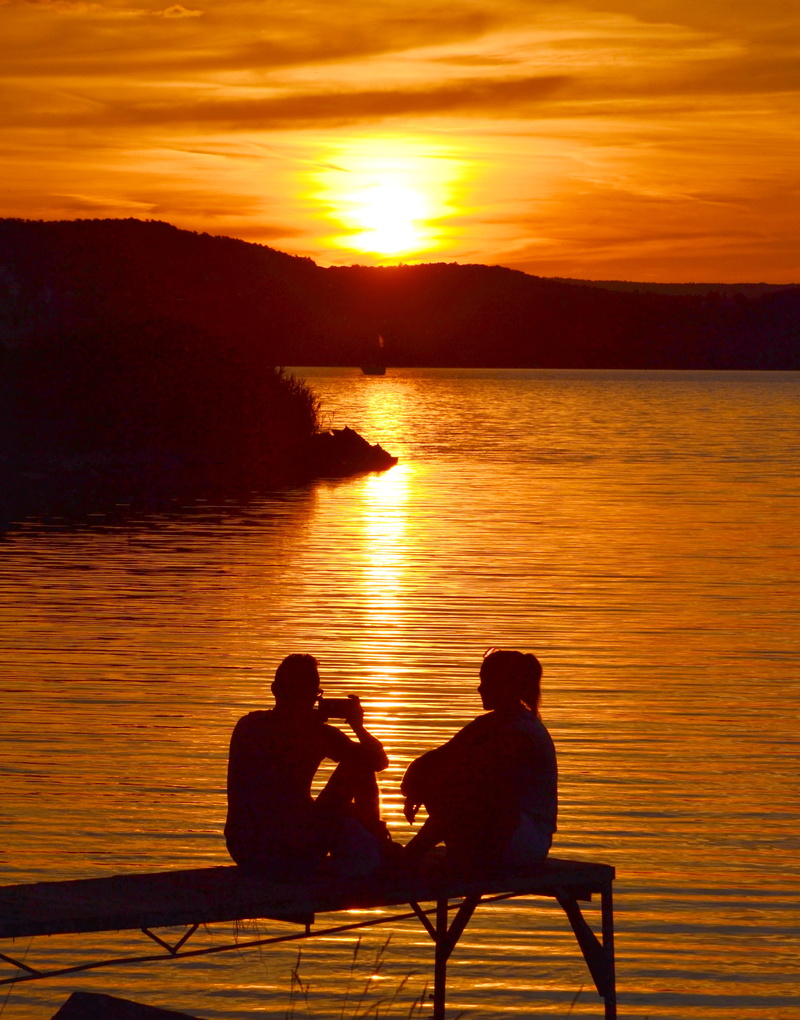 tranquil scene, gold, tranquility, leisure activity, two people, nature, relaxation, colors, sea, romantic, silhouette, light, sunset, sky, outdoors, scenics - nature