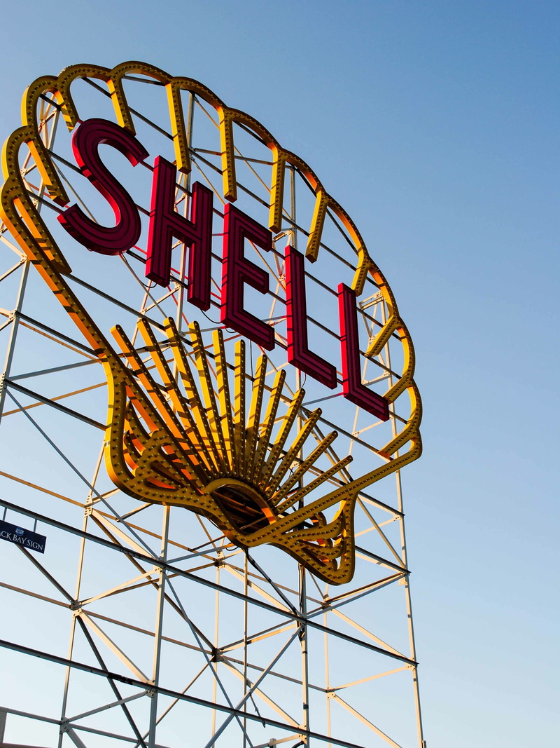 nature, amusement park ride, traveling carnival, billboard, western script, steel, yellow, fun, amusement park, blue, shape, sky, text, arts culture and entertainment