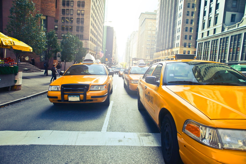 land vehicle, new york, mode of transportation, building exterior, motion, car, city life, architecture, cab, transport, city, office building exterior