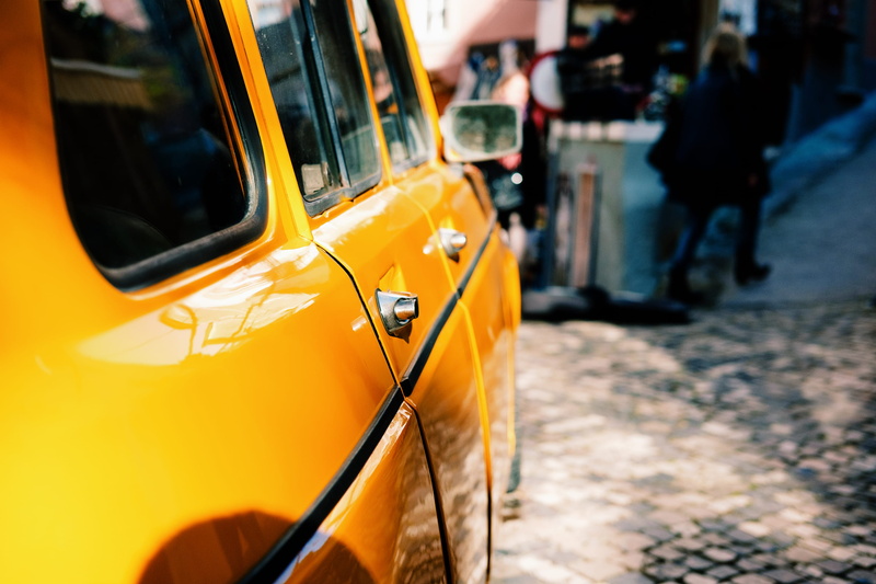 city, architecture, yellow, car, mode of transportation, holiday, motor vehicle, taxi, car door, travel, transportation, 4l, rickshaw, city street, focus on foreground