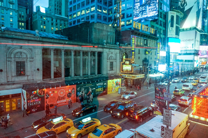 land vehicle, city street, office building exterior, bus, ny, outdoors, timessquare, car, night, mode of transportation, city life, road, street, motor vehicle