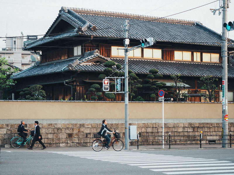 bicycle, lifestyles, group of people, women, osaka prefecture, architecture, ride, street, life, real people, built structure, city, temple, building exterior