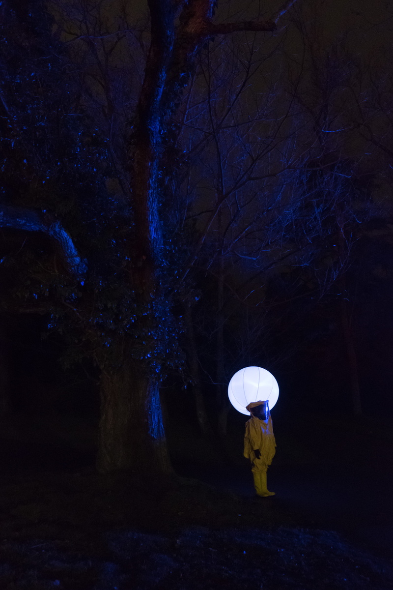 one person, performance, plant, umbrella, outerspace, leafless, land, illuminated, white, beauty in nature, outdoors, standing, nighttime, 4K, full length