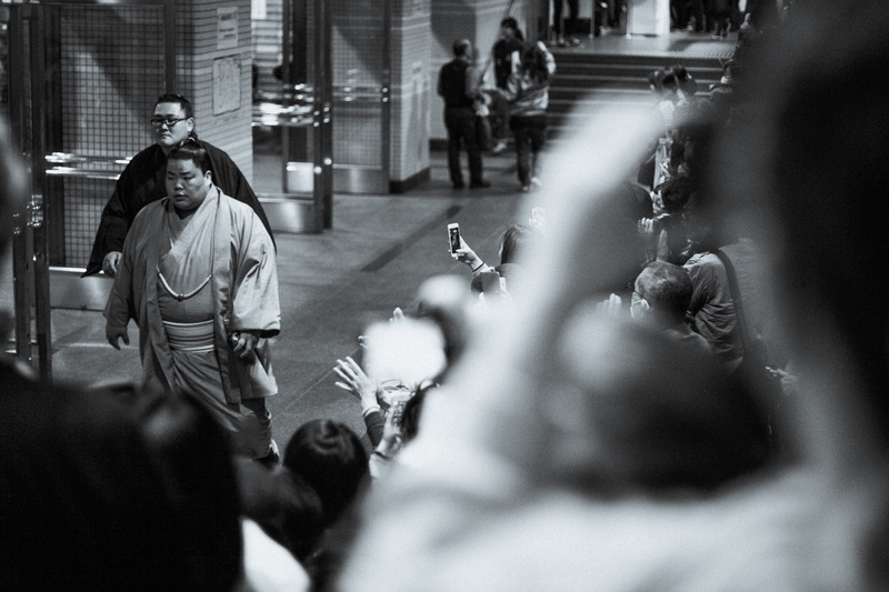 architecture, portrait, grayscale, real people, day, group of people, selective focus, subway, aisle, corridor, mammal, people, crowd, pedestrian, motion