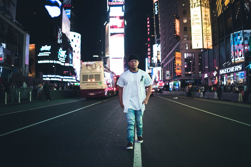 real people, casual clothing, city street, one person, built structure, timesquare, lifestyles, newyork, sonya7, illuminated, front view, building exterior