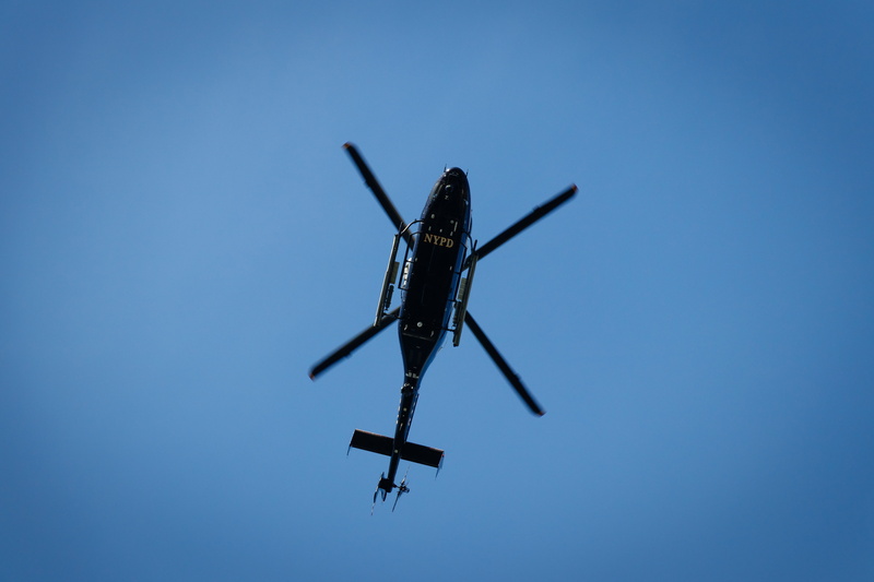 motion, mid-air, helicopter, brooklyn bridge, nypd, no people, united states, airplane, on the move, nature, sky, aerospace industry, air vehicle, new york police
