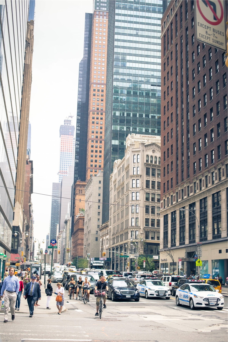 crosswalk, city, cars, tower, skyscraper, streets, built structure, financial district, office building exterior, car, city street, city life, people, roads