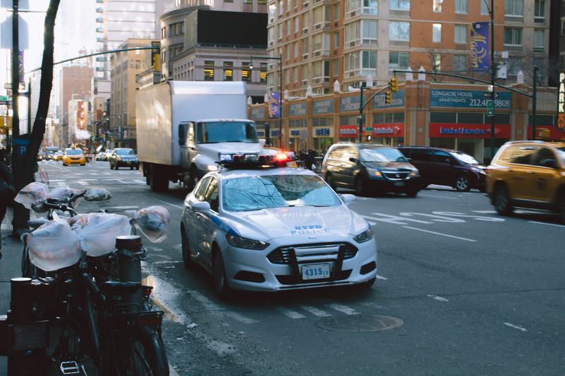 road, trump, day, motor vehicle, building exterior, real people, mode of transportation, cop, city, group of people, new york, nyc, traffic, men, incidental people