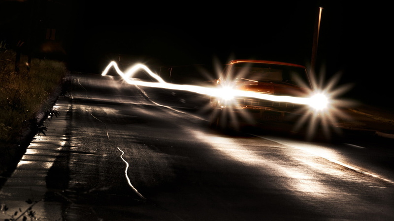 light trail, sky, pattern, motor vehicle, illuminated, sun, star, long exposure, bright, city, mode of transportation, land vehicle, dark, transportation