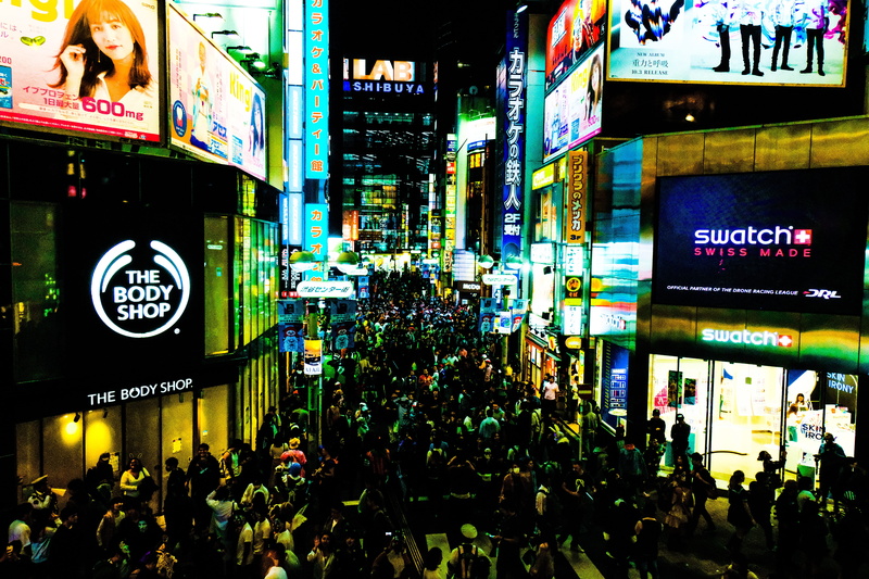 real people, nightlife, sign, built structure, commercial sign, architecture, city, neon, outdoors, communication, building exterior, large group of people