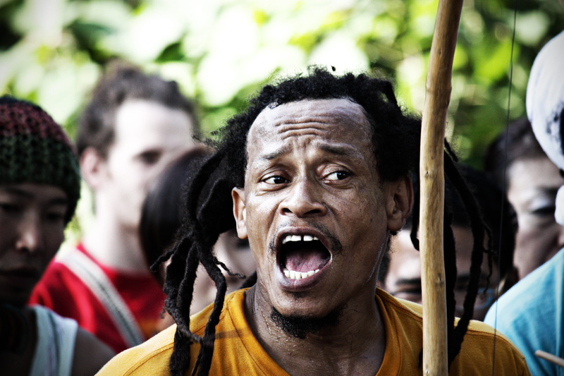 mouth, spectator, emotion, mouth open, focus on foreground, espression, outdoors, brazilian, portrait, man, young adult, group of people, yoyogi park outdoor stage