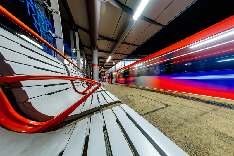 banister, motion, station, train - vehicle, corridor, human, photography, bench, furniture, flooring, speed, long exposure, transportation, vehicle, architecture
