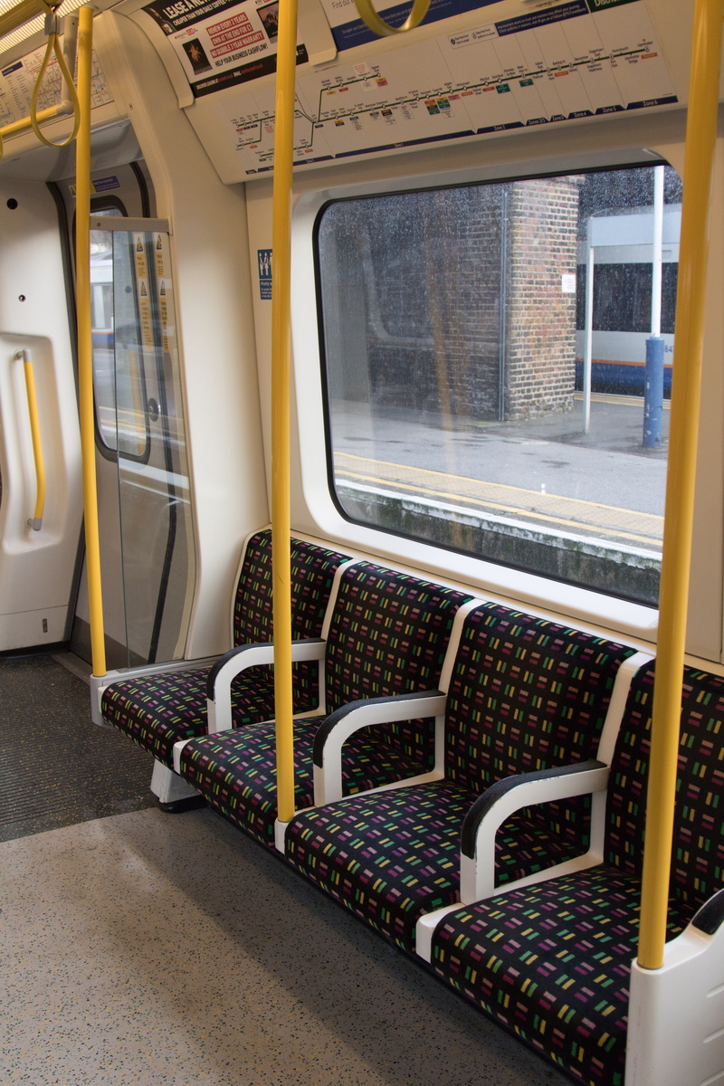 subway train, train interior, empty, vehicle seat, tube, outdoors, seat, transparent, public transportation, passenger train, district line, transportation