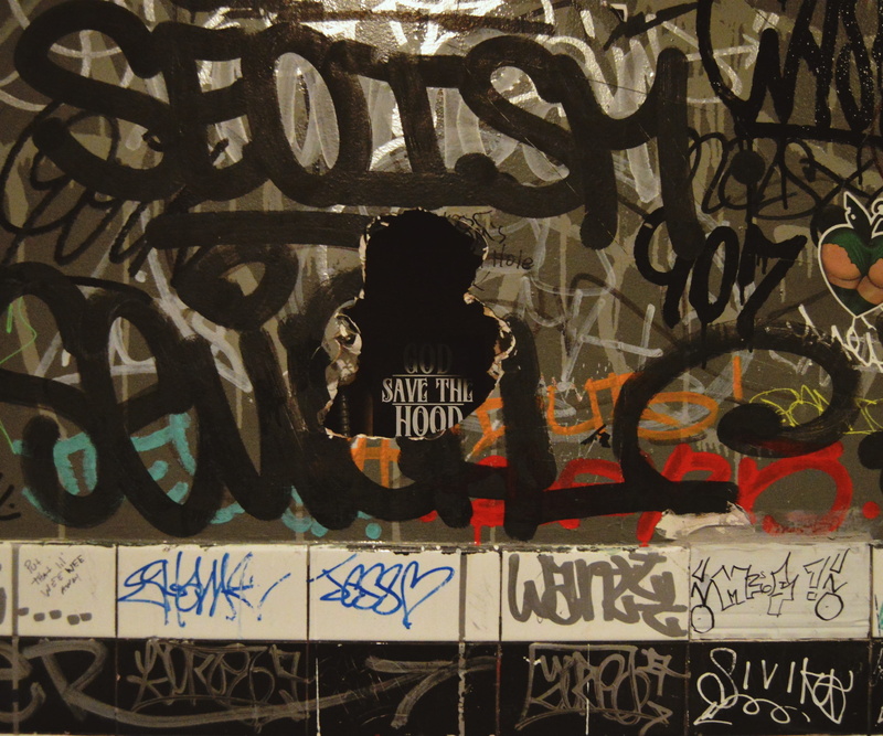 painting, wall - building feature, text, label, advertisement, bathroom, banner, word, western script, graffiti, street art, urban, art, handwriting, human representation