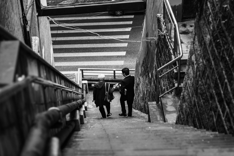 day, direction, women, selective focus, architecture, full length, group of people, the way forward, building exterior, walking, black and white, help