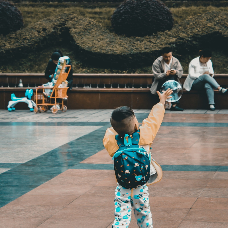 play, traditional clothing, holding, bubbles, asia, people, reaching, casual clothing, three quarter length, boys, men, candid, chinese, outdoors, real people