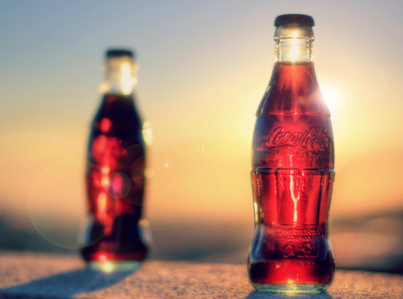 bottle, sky, alcohol, container, no people, glass - material, cocacola, transparent, drink, hdr, bottles, two, table, focus on foreground, coca, close-up