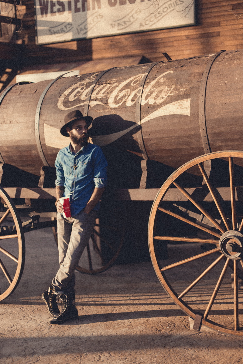 cool, full length, wagon, spoke, 5K, one person, men, barrel, apparel, leaning, front view, shoe, machine, occupation, transportation, blue, vehicle, wood