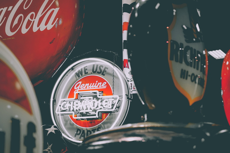 emblem, coca, western script, chevrolet, vehicle interior, text, paris expo porte de versailles, close-up, communication, transportation, number, drink