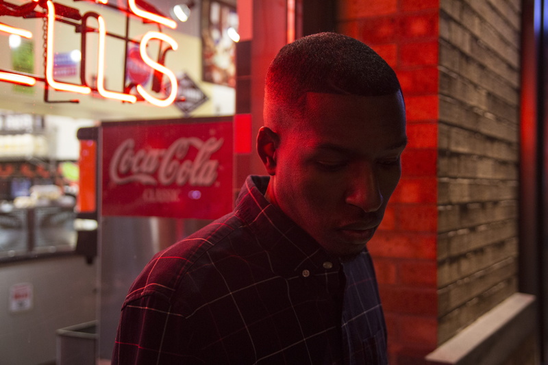 night, standing, light, dress, leisure activity, looking, brick wall, text, waist up, young men, 5K, coke, drink, cola, portrait, communication, street