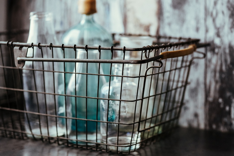flooring, household equipment, shopping Cart, focus on foreground, glass - material, bottles, store, close-up, metal, food and drink, trapped, nature, cage