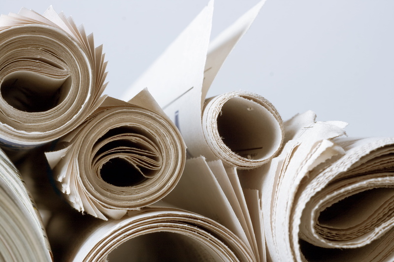 text, business, large group of objects, newspaperheadlin, focusonforegroun, artsandentertain, document, press, indoors, stack, circle, heap, breakingnews