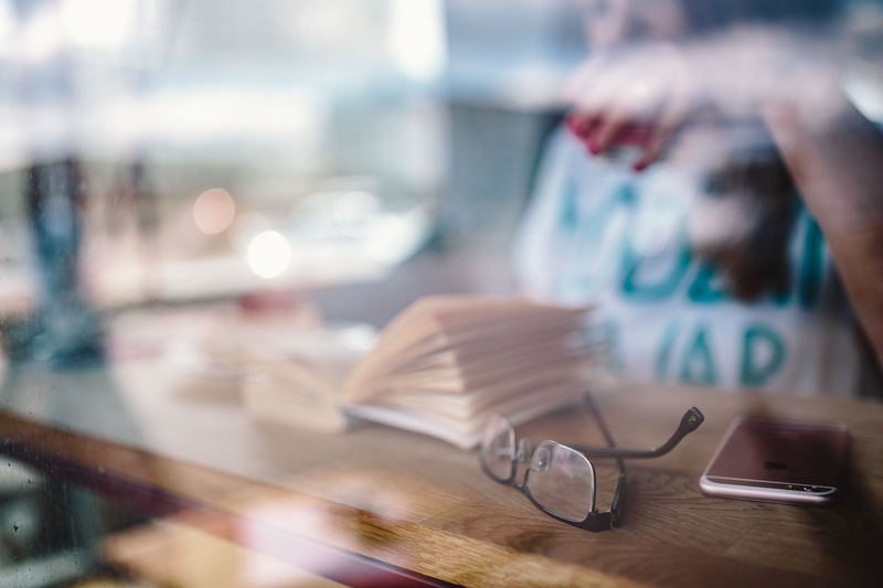 eyeglasses, women, reading, indoors, glasses, young, cafeteria, book, shop, business, focus on foreground, young adult, window, young women, 4K, caucasian