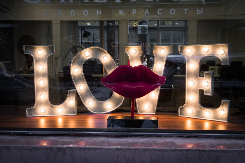 window, architecture, sphere, lights, clothing, store window, vehicle, number, transportation, communication, retail display, love, reflection, stage, transparent