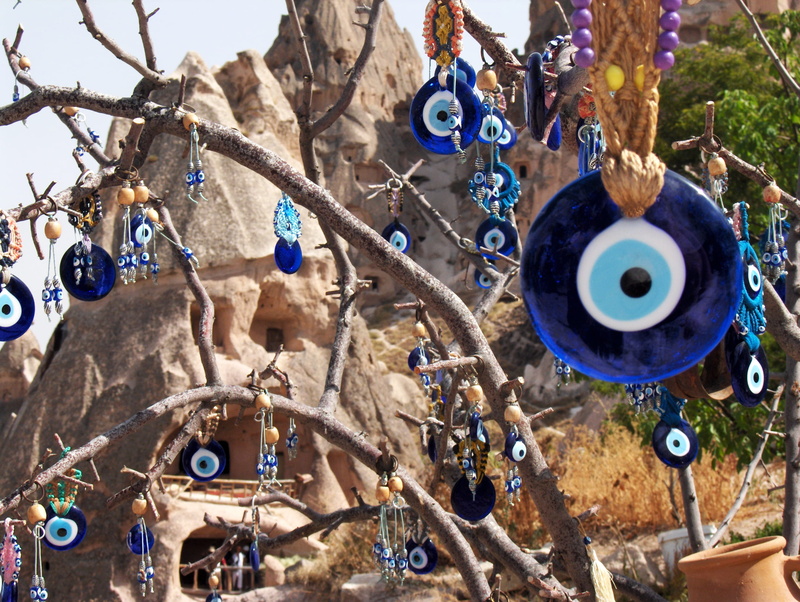 no people, accessory, tree, nazar, musical instrument, spoke, bird, nature, sphere, focus on foreground, amusement park, capadocia, hanging, religion, large group of objects