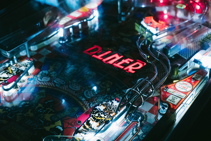 high angle view, neon, black, city, retail, architecture, yellow, pinball, 5K, transportation, la, light, closeup, building exterior, arcade, photo, pinpall