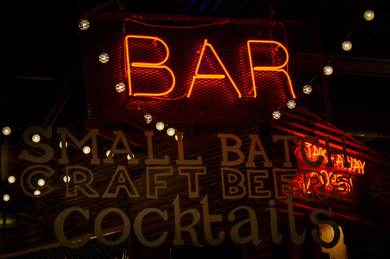 decoration, capital letter, sign, architecture, western script, glowing, hanging, neon, red, bar, light, orange, text, technology, no people, outdoors