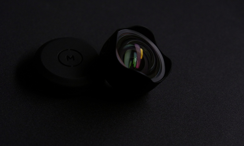 close-up, 5K, shape, reflection, phone lens, indoors, camera, black background, no people, high angle view, technology, power supply, lens - optical instrument