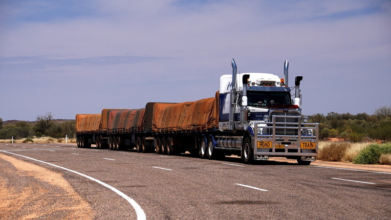 Australia, commercial land vehicle, motion, multiple lane highway, land vehicle, transportation, mode of transportation, Western Star, Outback, trucking