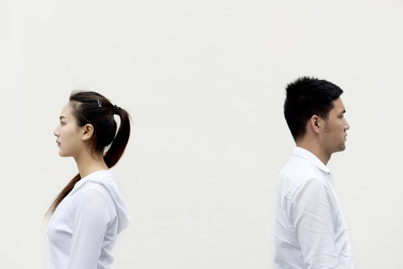 white background, casual clothing, looking, man, back to back, people, black hair, men, hair, young adult, young men, profile view, hurt, stands, waist up