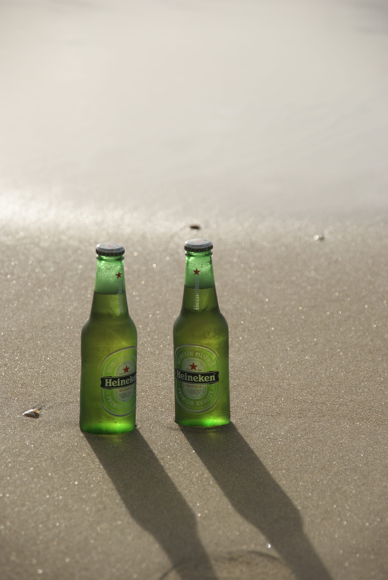 no People, transparent, friends, glass - material, alcohol, green, clear, indoors, drink, close-up, refreshment, bottle, beer - Alcohol, beach, beer bottles
