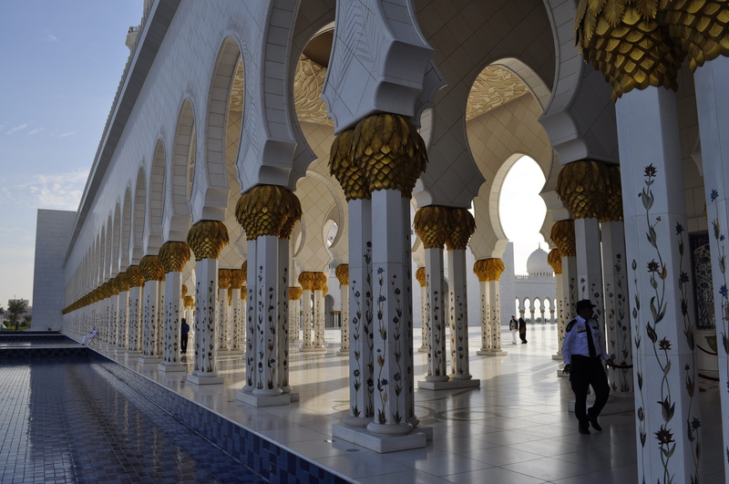 building, architectural column, day, islam, muslim, Sun, belief, walking, travel, place of worship, built structure, tourism, architecture, arcade, incidental people