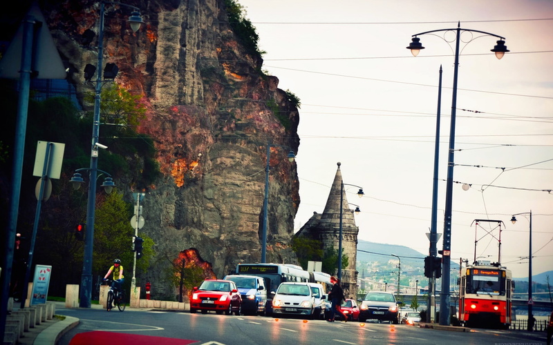transportation, mode of transportation, car, outdoors, day, running, traffic, cable, architecture, post, nature, road, beside, building exterior, travel