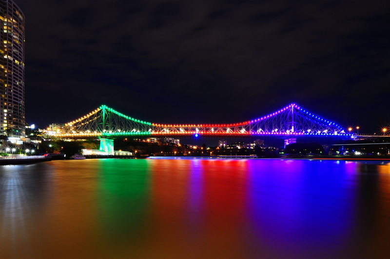 downtown District, illuminated, water, city, architecture, nightlife, river, cityscape, bridge - Man Made Structure, sky, urban Scene, travel destinations