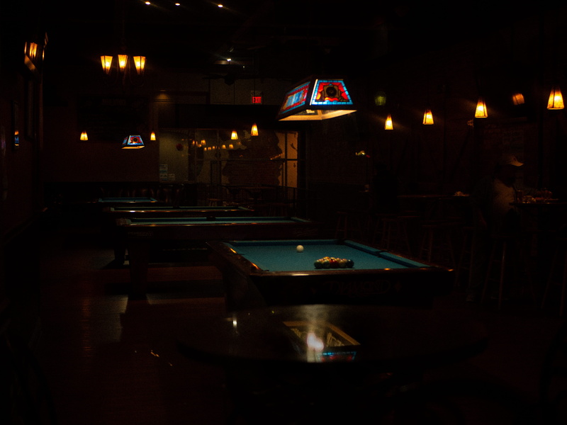 street, pool hall, absence, bench, street photography, lighting equipment, furniture, dark, pub, room, illuminated, sport, night, ball, pool ball, no people